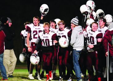 On to the playoffs: Bulldogs win against Mott-Regent, 54-50, in gripping game